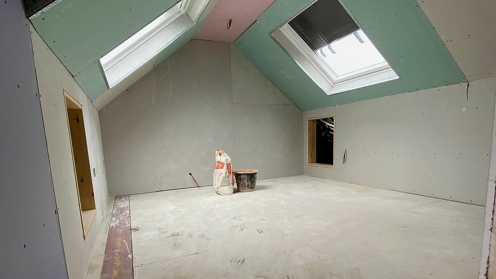 Loft conversion boarded out before plastering, a building regulations inspection stage on a Wilson & Cole site in Bristol