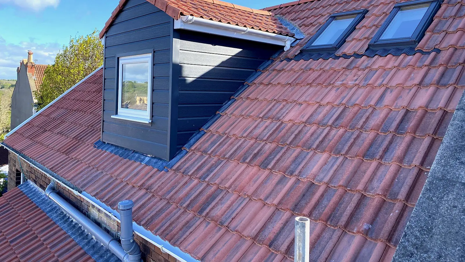 Grey rear dormer with two roof windows built by Wilson & Cole, the style of loft conversion Bishopston terraces suit