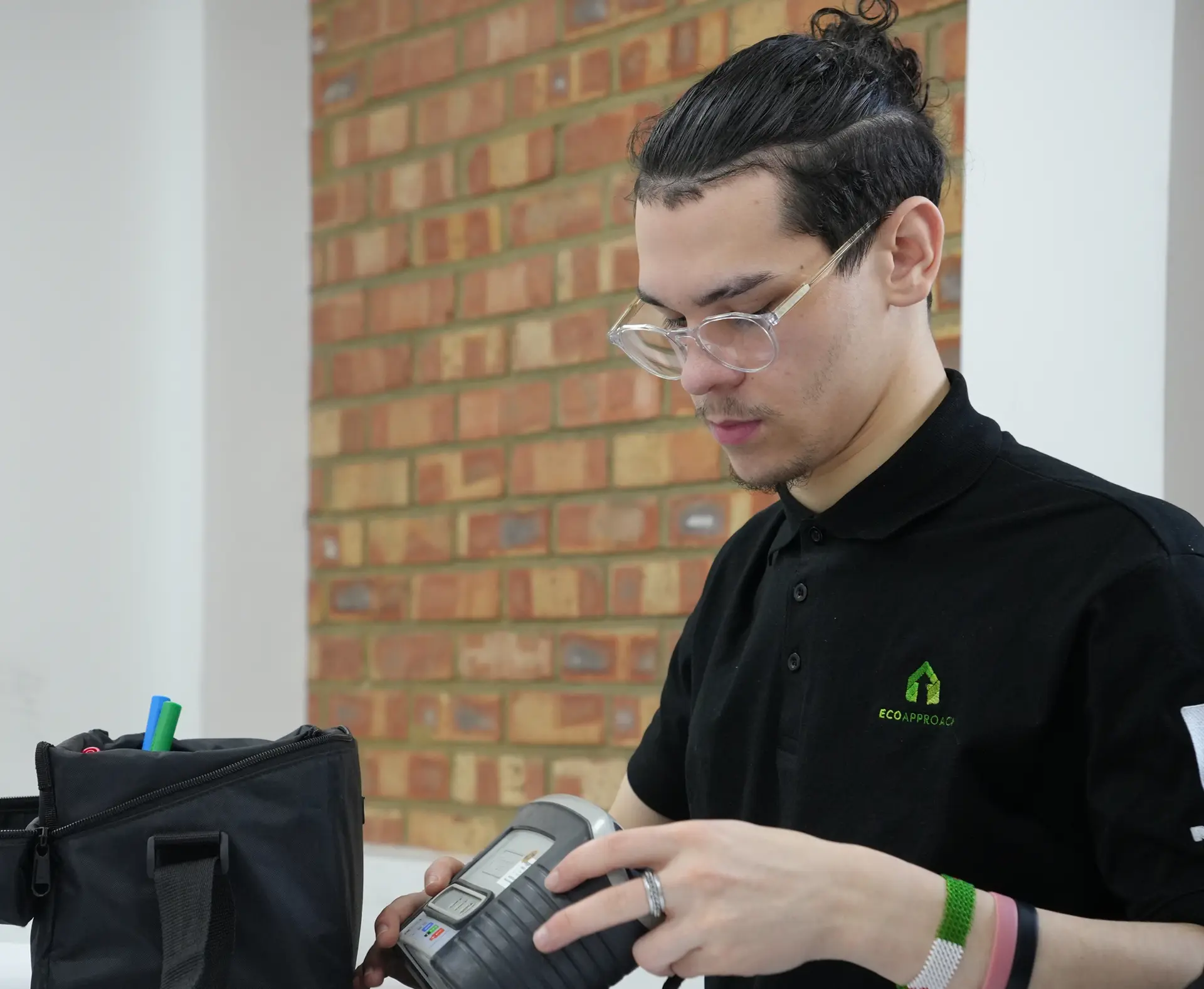 An Eco Approach surveyor recording data during a property survey