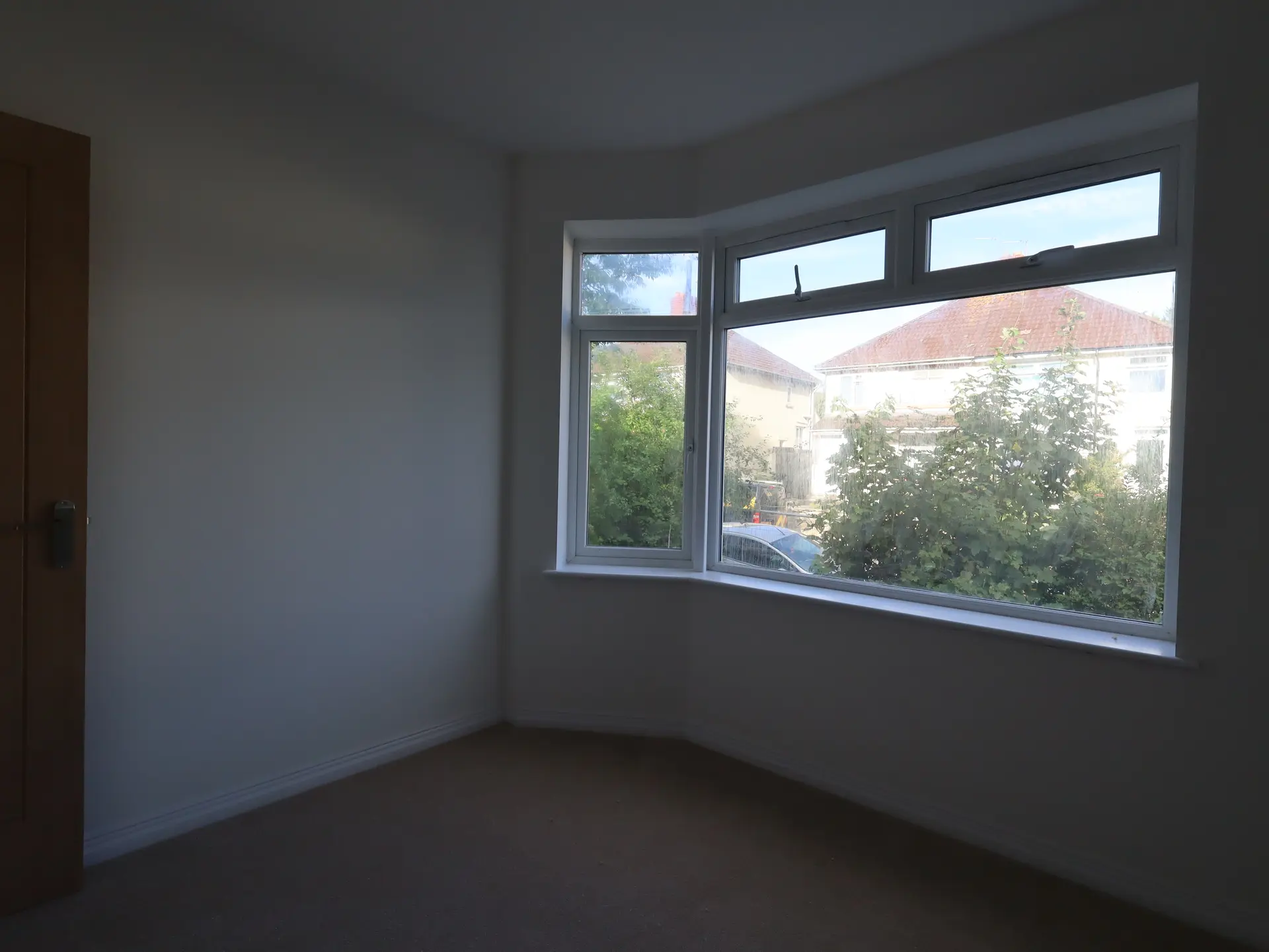 Bedroom bay window looking out over Brislington rooftops