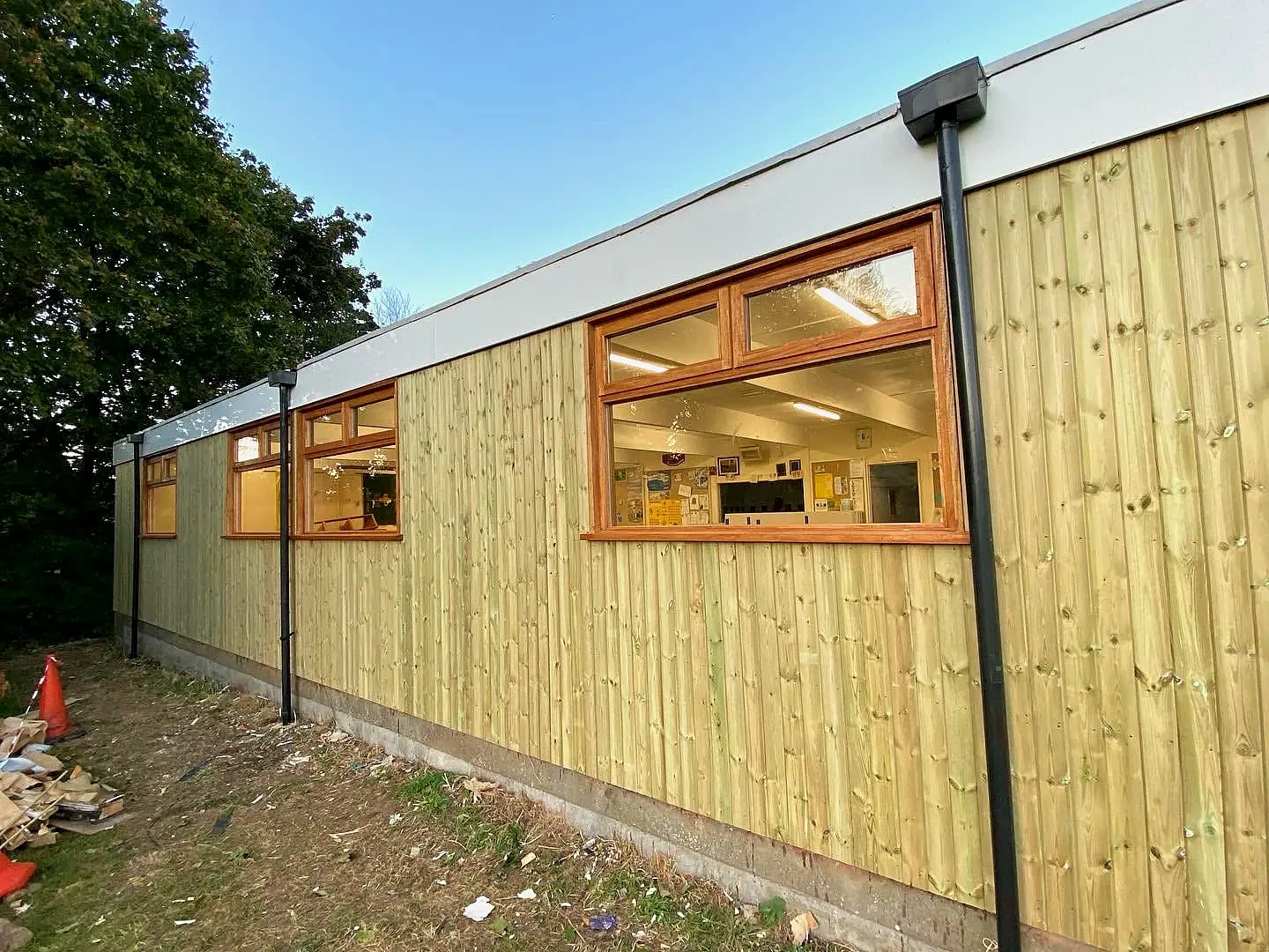 Commercial building with timber cladding after external works