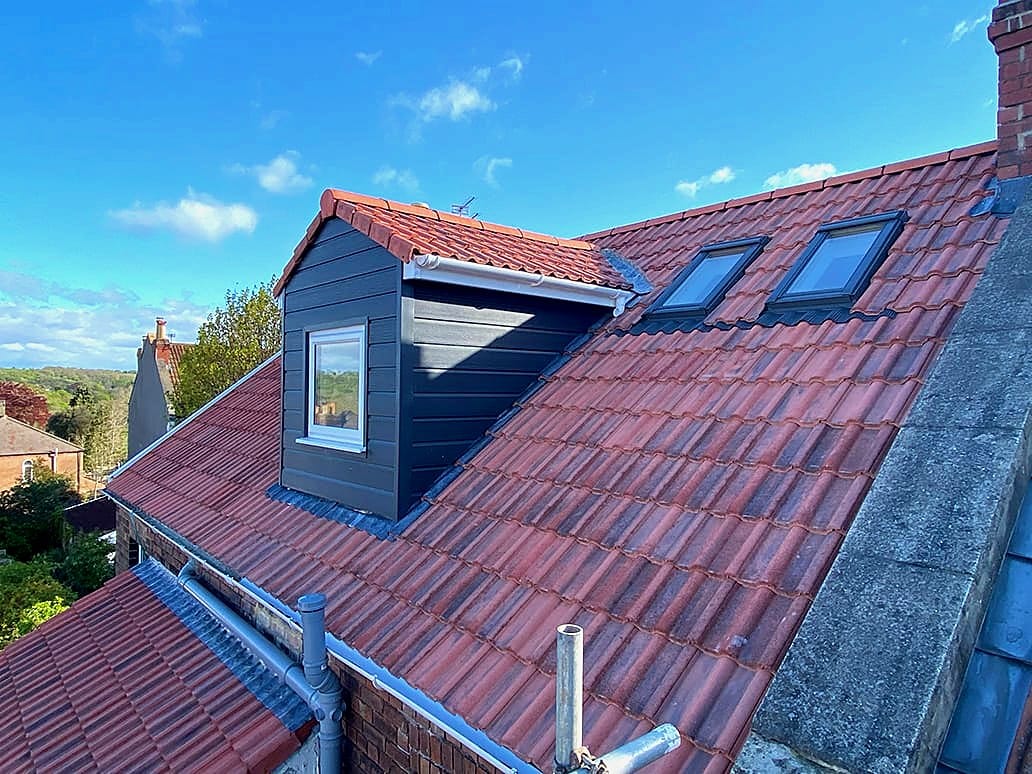Rear dormer loft conversion with two rooflights on a Bristol terrace by Wilson & Cole