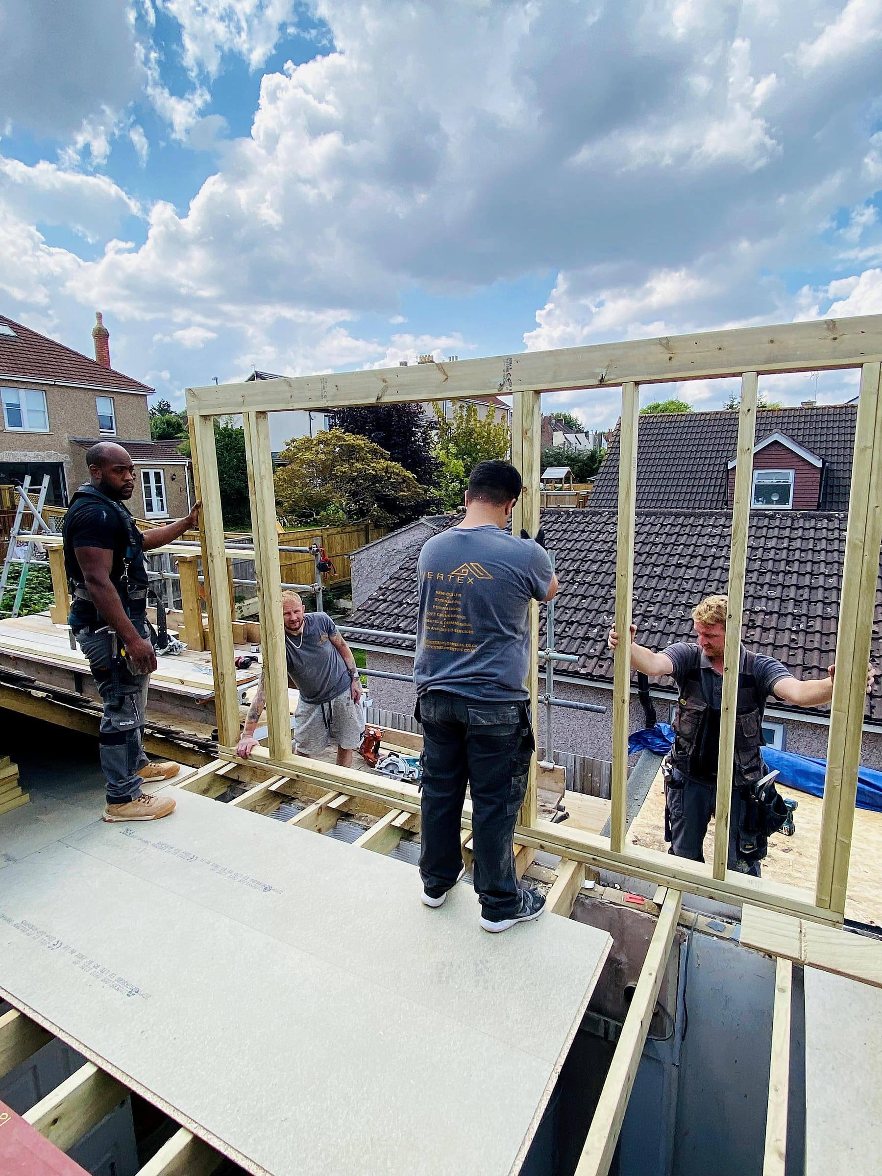 Wilson & Cole carpenters raising the timber frame of a dormer loft conversion in Bristol